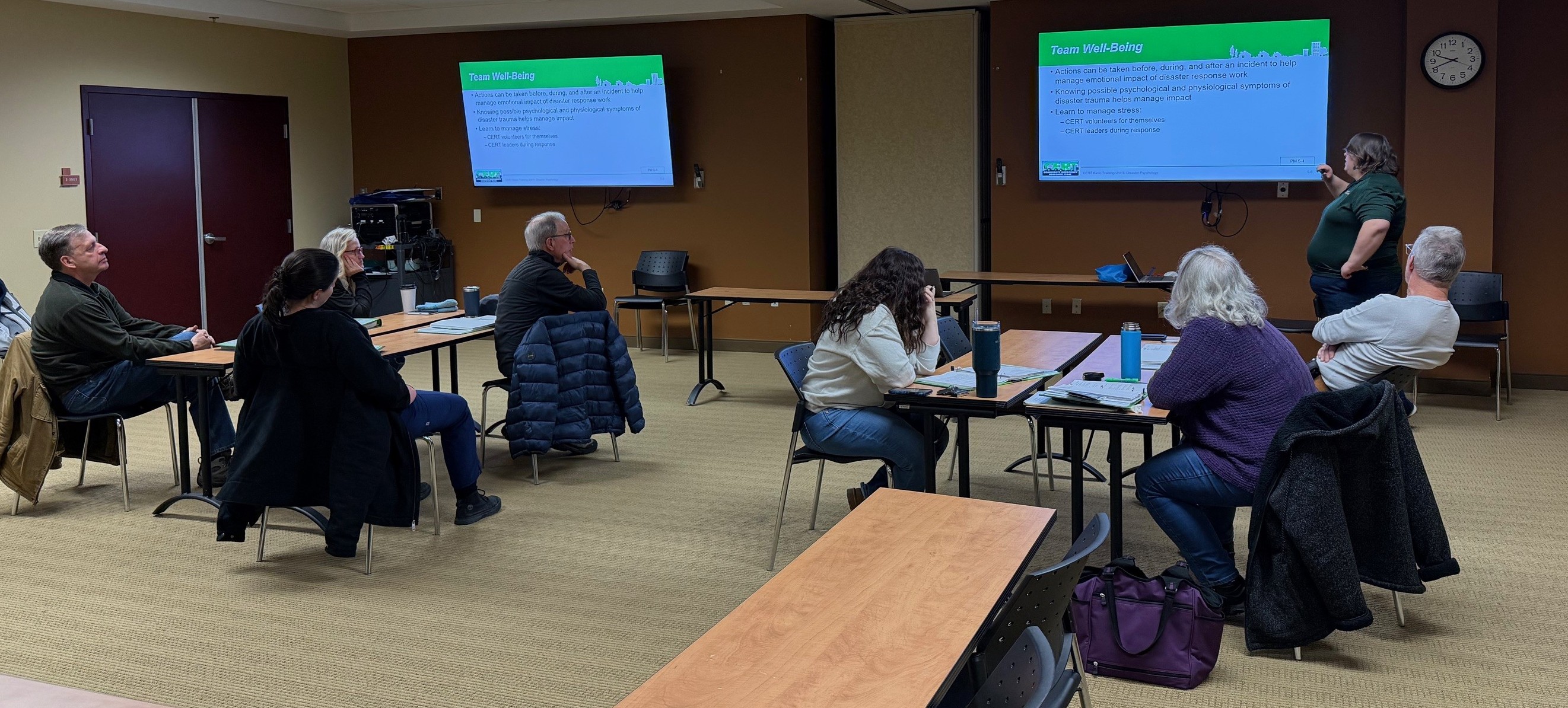 Picture of seven menbers of Warren County's Community Emergency Response Team meeting in a classroom for training