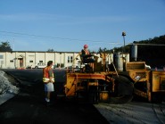 Crew rolling asphalt