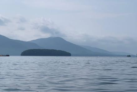 Picture of Lake George in the summer with Dome Island in the background