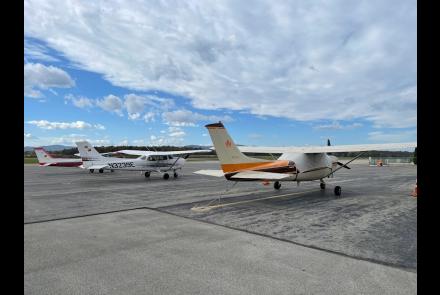 picture of planes parked on tarmac at Warren County Airport