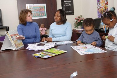 People gather at conference table